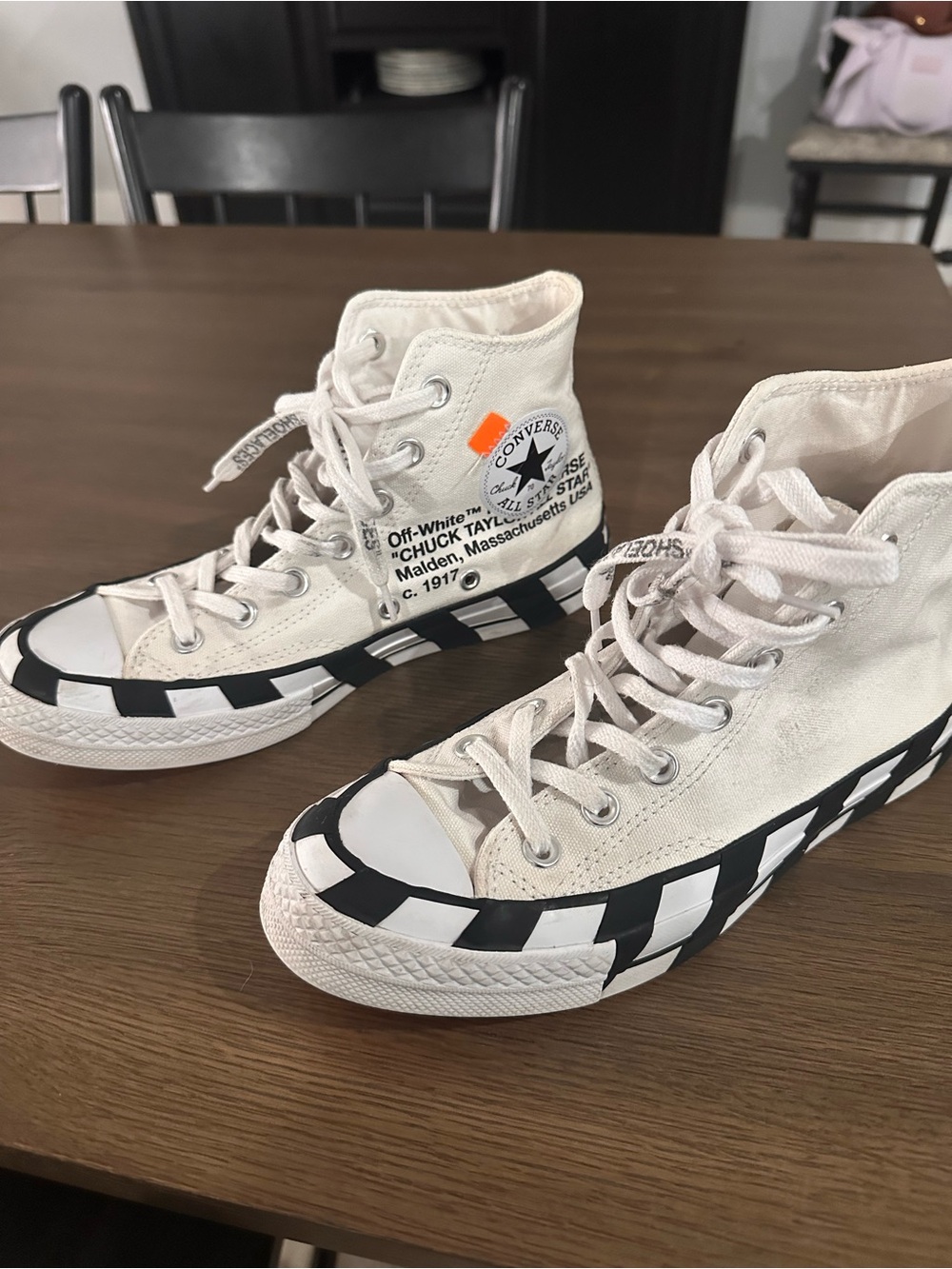 Converse High-Top Sneakers in Off-White with Black and Orange Accent